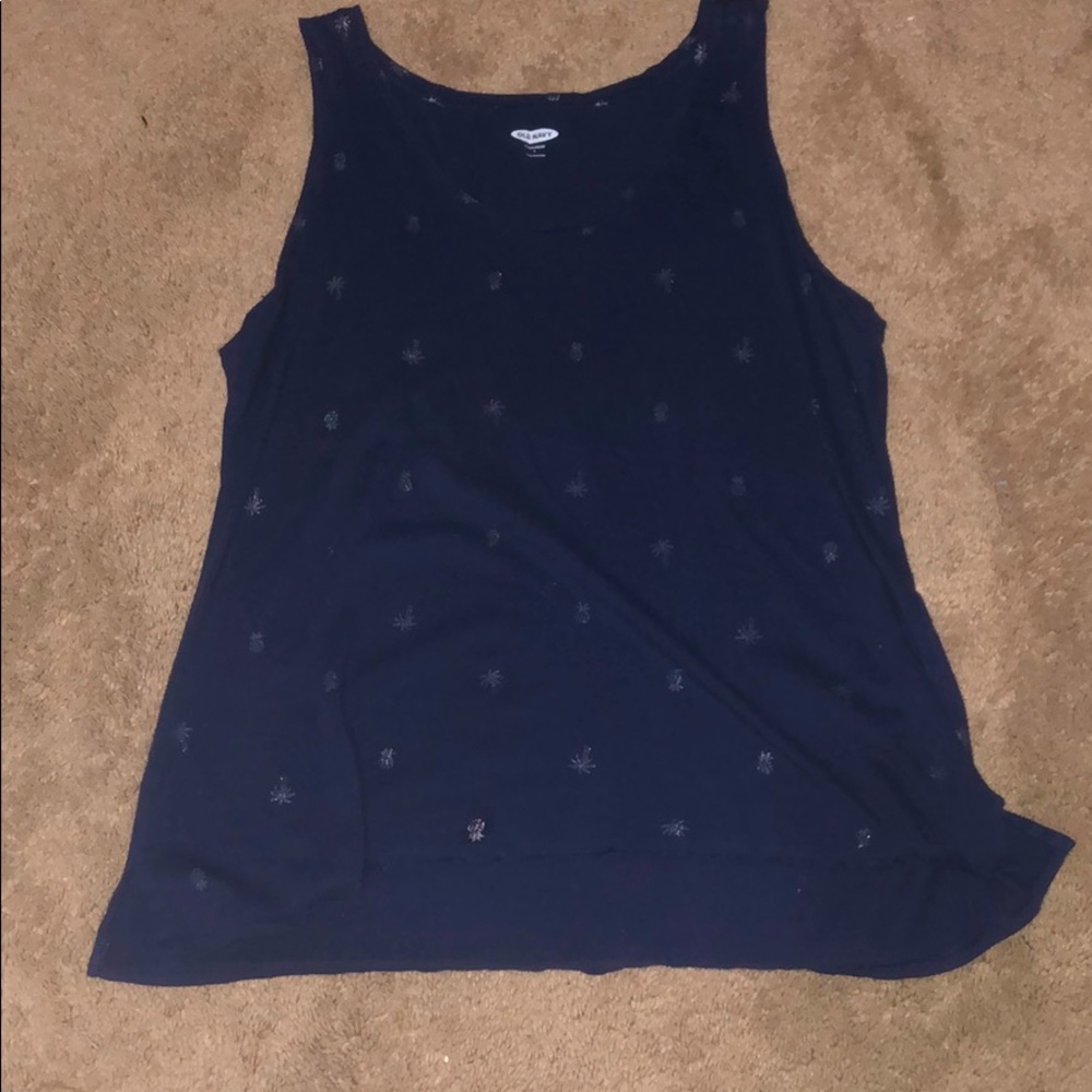Navy blue tank top with pineapples and palm trees.